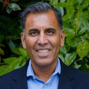 headshot of singh