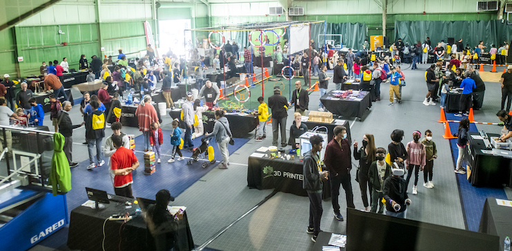 people milling around a science festival