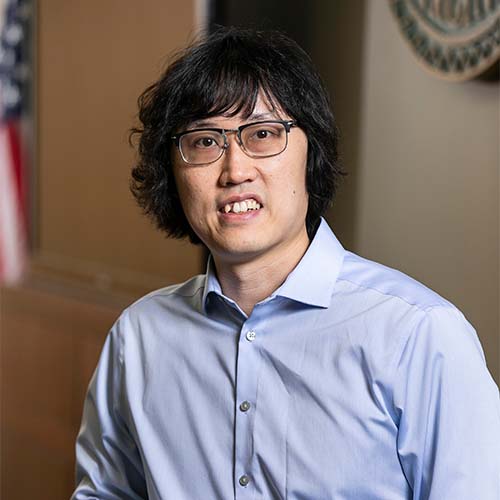 Mason CS associate professor Craig Yu