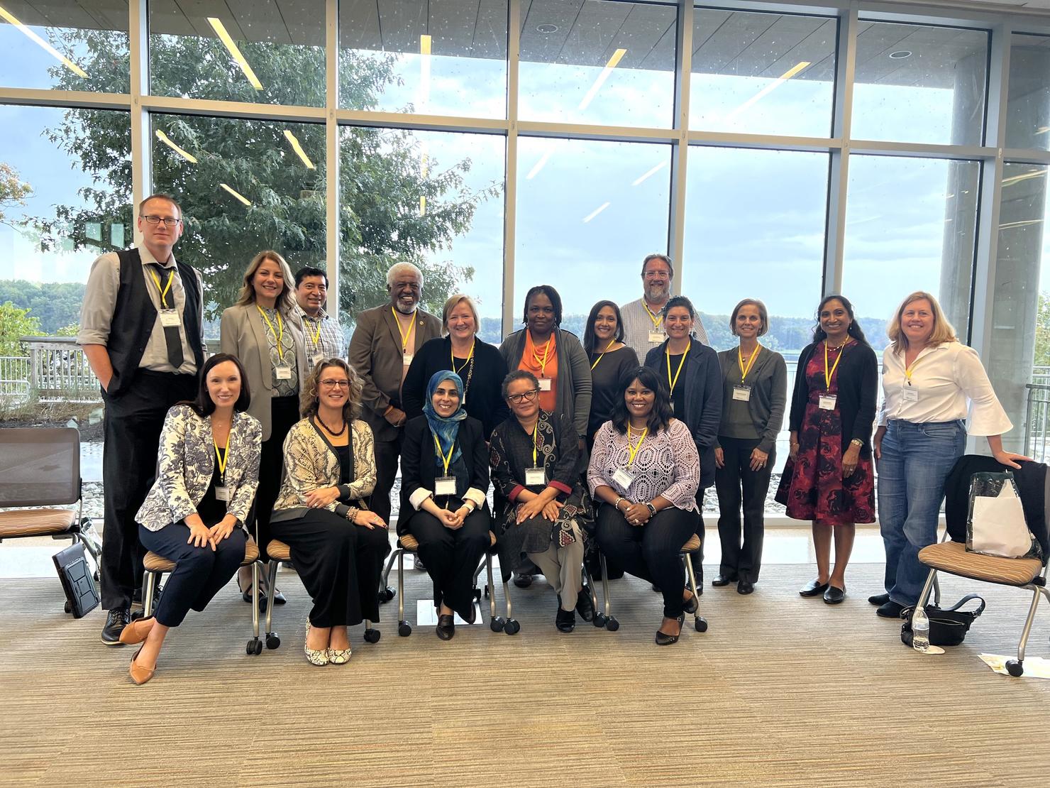 Group of academic ombudspersons pose together at the Potomac Science Center