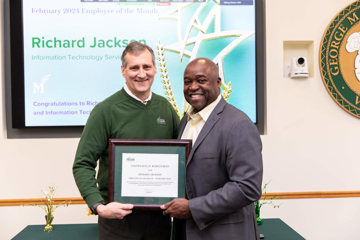 Employee of the Month Richard Jackson with Mason President Gregory Washington