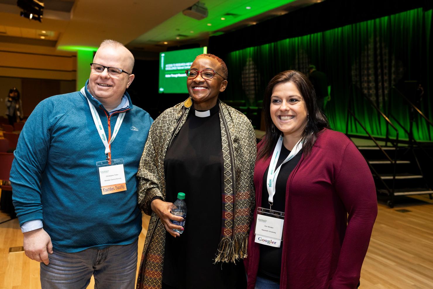 Rev. Nontombi Naomi Tutu, keynote speaker, with two conference attendees