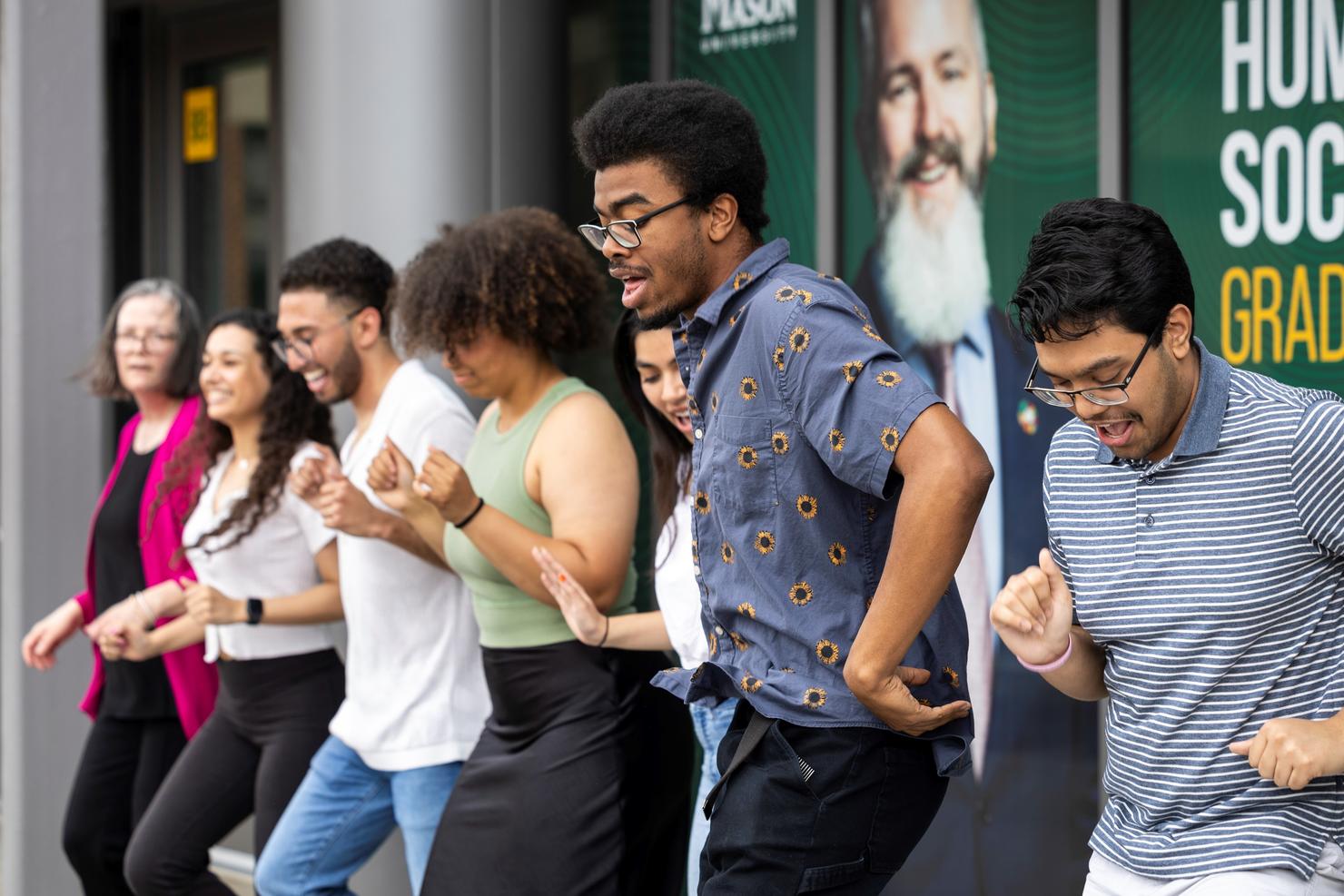Student models dance at a brand photo shoot