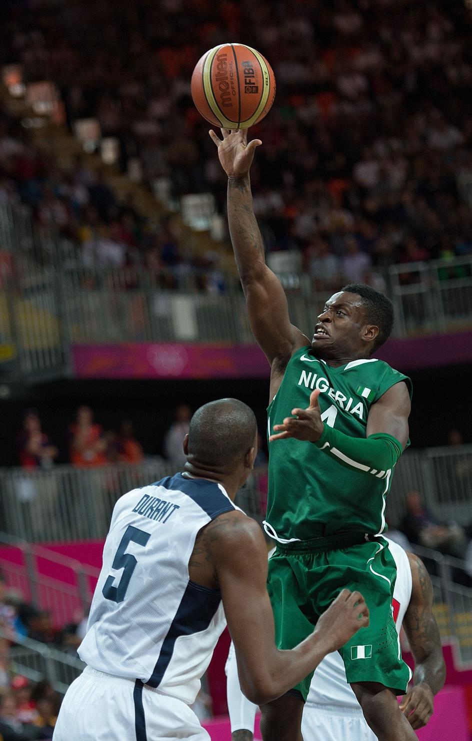 Tony Skinn reaches for the basketball while playing for the Nigerian national team at the London 2012 Olympics