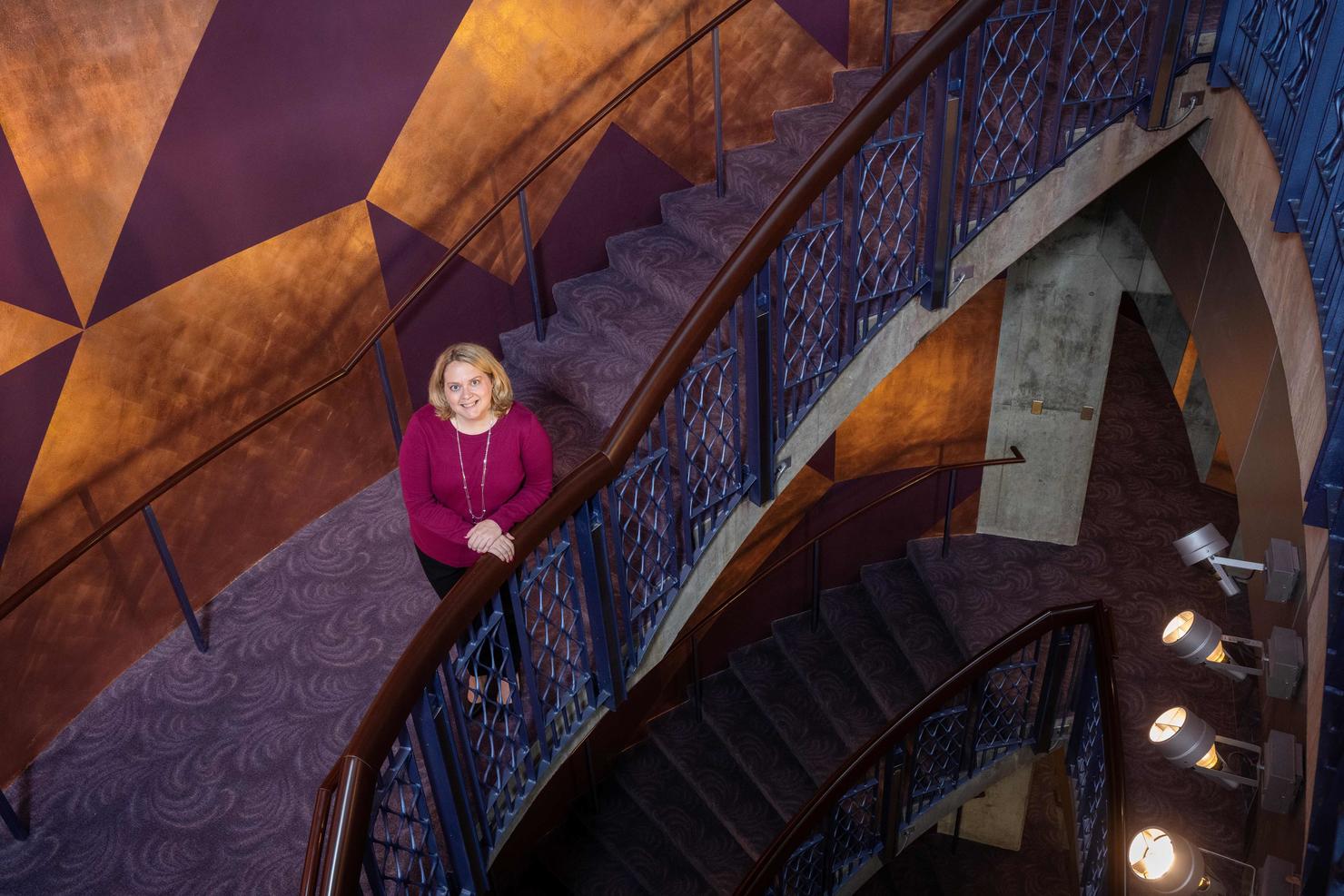 Marit Majeske on the staircase at Hylton Center