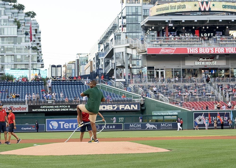 Athletic Director Marvin Lewis prepares to throw out the ceremonial first pitch.