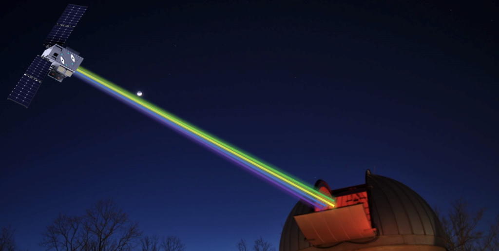 a colored beam of light from a space mission into space