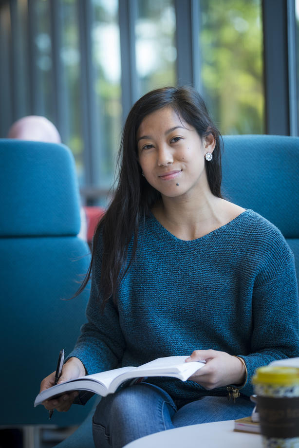 Student in Mason's Fenwick Library on the Fairfax Campus