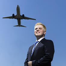 Mack Freilich with a plane flying overhead