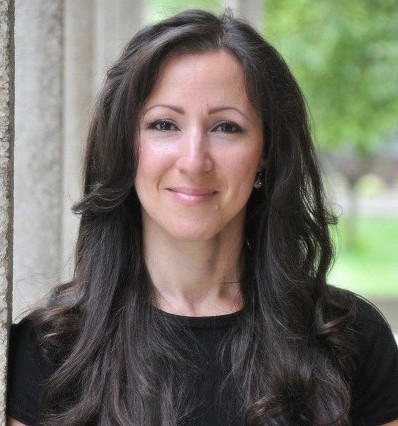 Ingrid Guerra-López stands outside wearing a black shirt