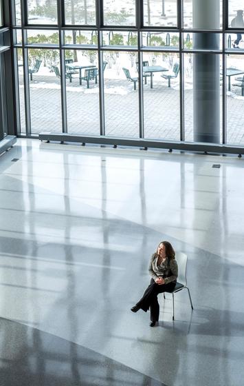 Rachel Wernicke sits in an open space in Horizon Hall