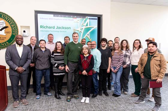 Richard Jackson and colleagues at the Employee of the Month ceremony