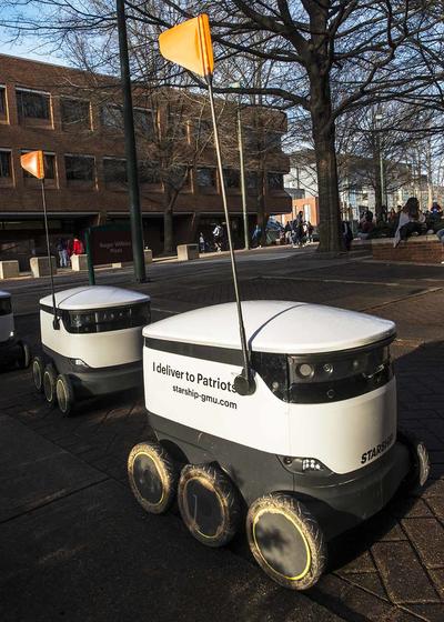 two starship delivery robots introduced at GMU