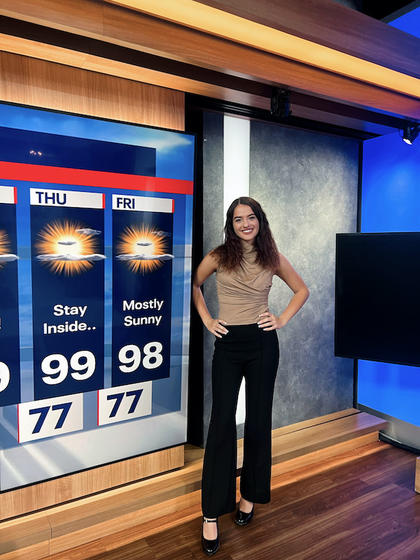 Bell Tucker at the FOX 5 DC studio interning as a weather personality. Photo by Shayla Brown.