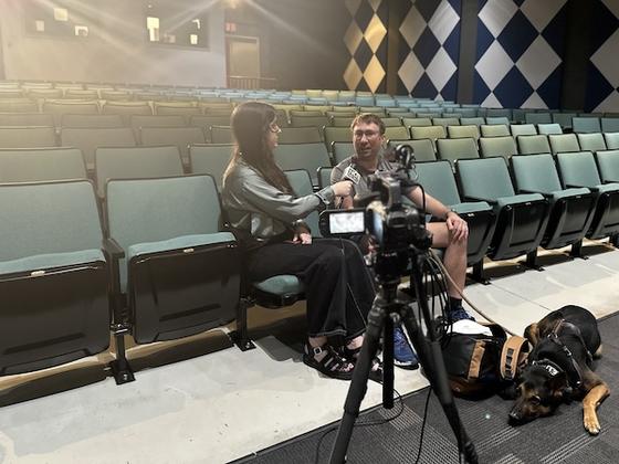 Alex Plank being interviewed by student, Madison Horan. Photo by Mason Cable Network.