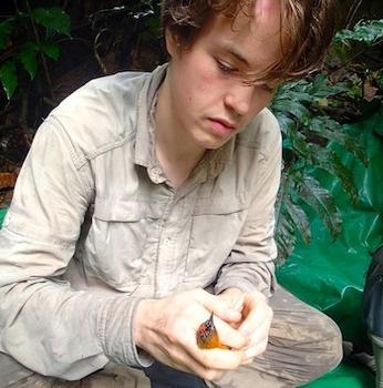 Coddington holding a bird.