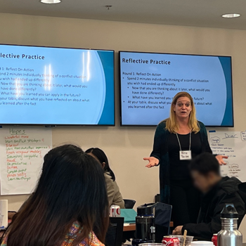 Associate Dean of Carter School, Juliette Rouge, leads a workshop at the retreat. Photo provided.