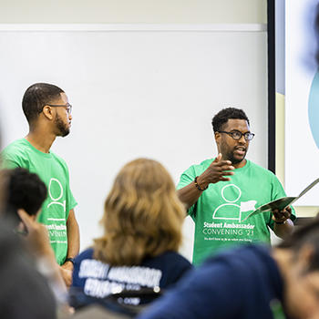 Cedric Price and Phil Wilkerson talk to their room of students about leadership