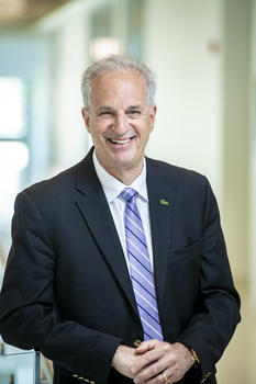 Mark Ginsberg is shown in a suit