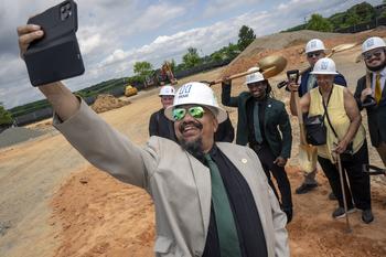 selfie at wellness building groundbreaking