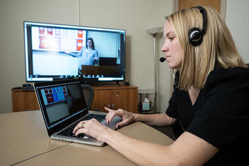 Coaches demonstrate providing real-time feedback to educator interns in their classrooms