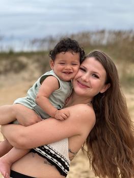 Graduation student speaker Caroline Little and her son, Saint. Photo provided.